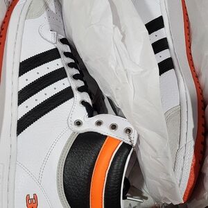 Adidas Men's White and Black Sneakers with Orange Accents